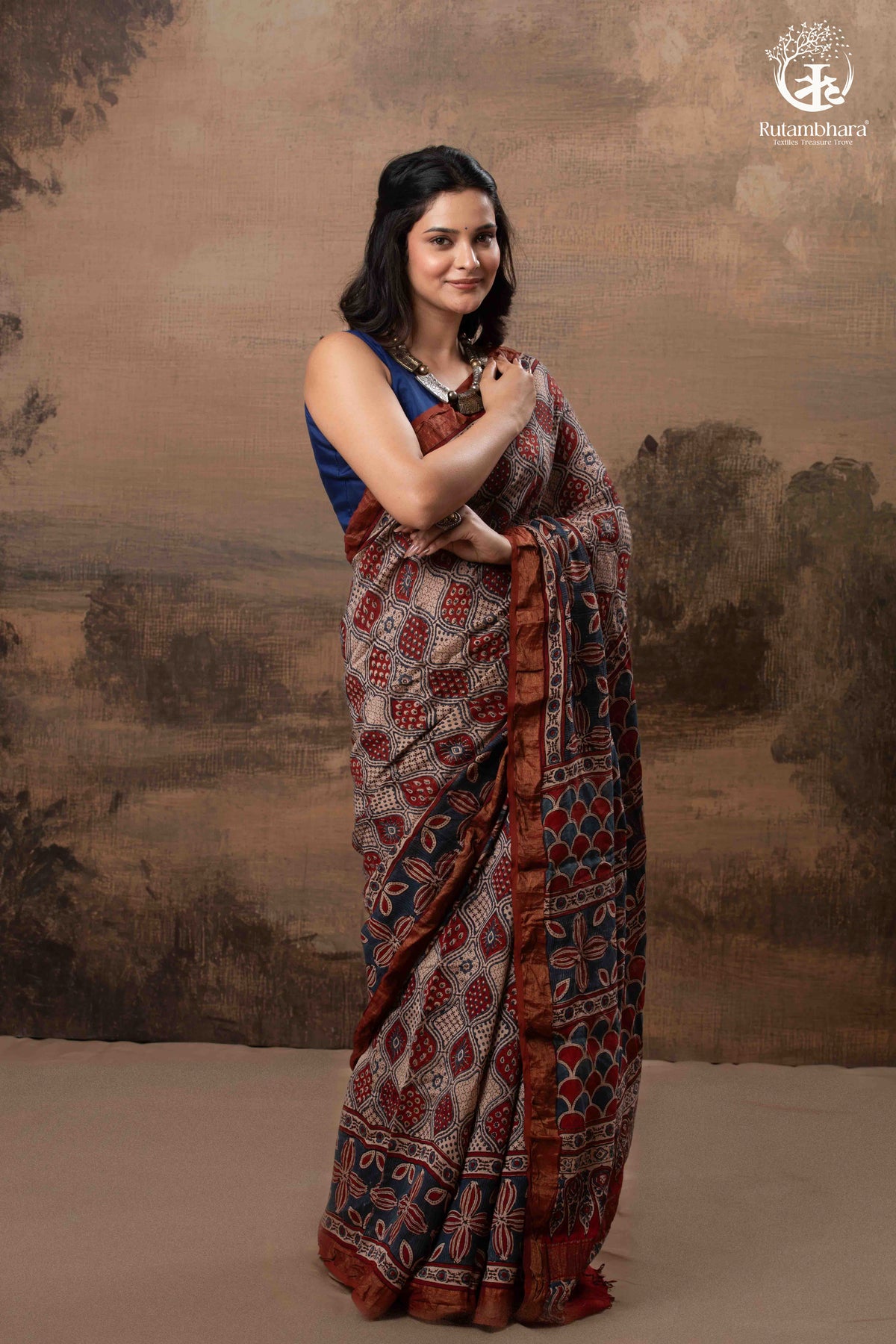 Ushraa - Rust Red & Indigo Ajrakh Silk Cotton Saree With Delicate Gold Zari Border