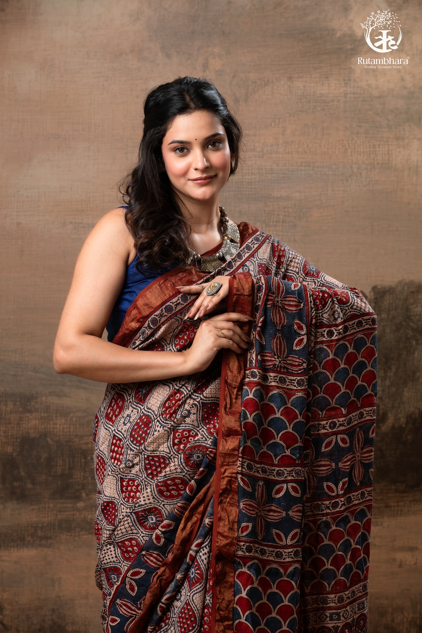 Ushraa - Rust Red & Indigo Ajrakh Silk Cotton Saree With Delicate Gold Zari Border