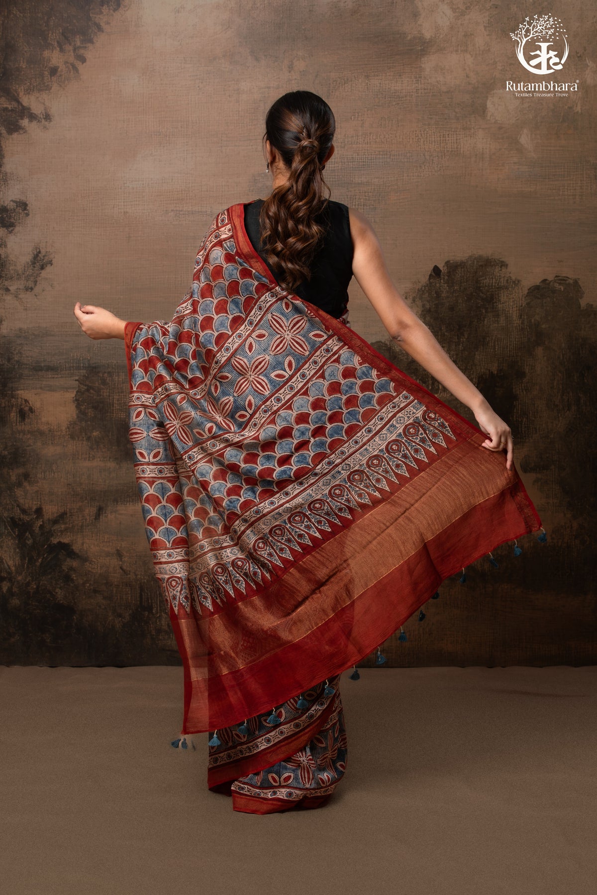 Ushraa - Rust Red and Indigo Ajrakh Silk Cotton Saree with Delicate Gold Zari Border