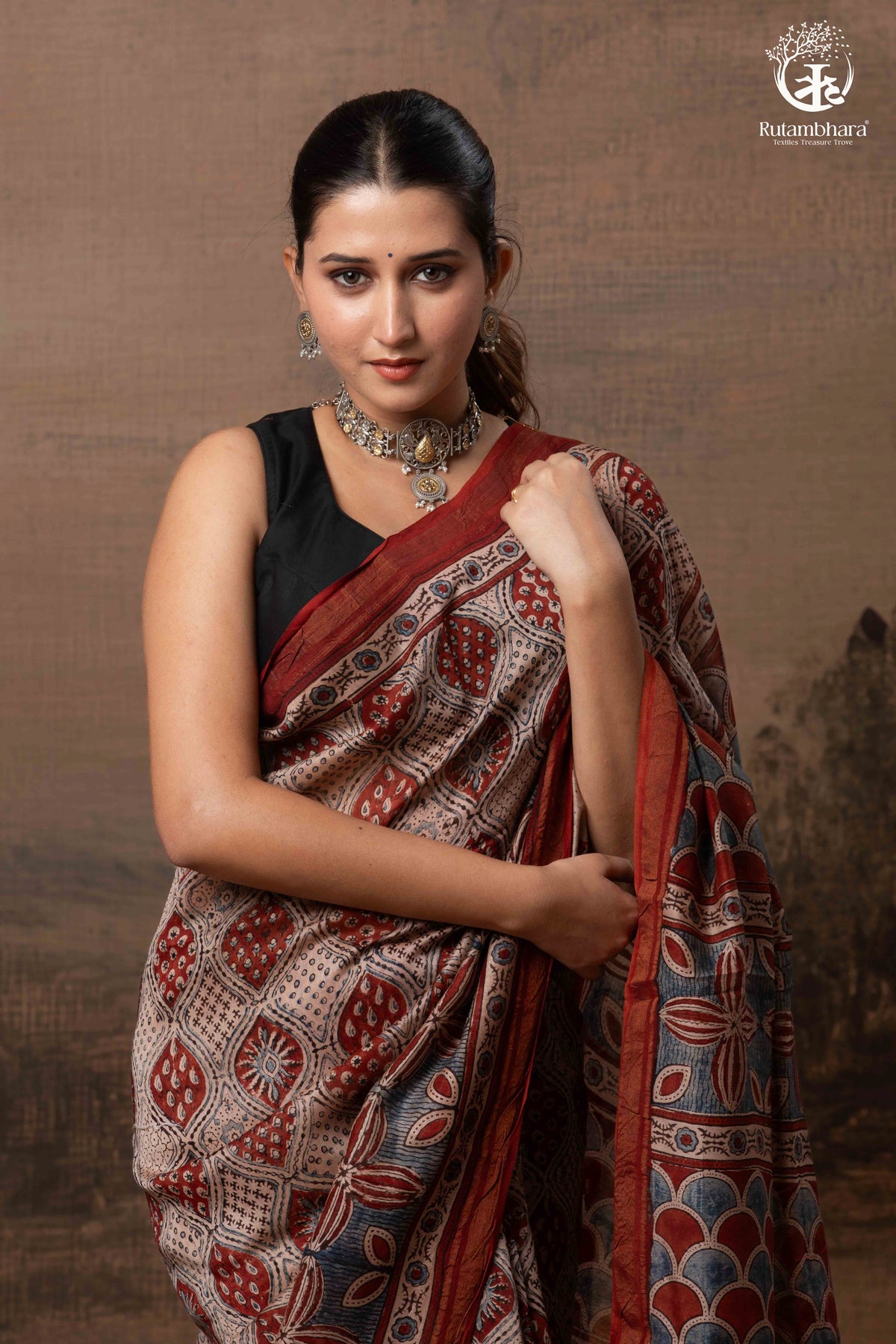 Ushraa - Rust Red and Indigo Ajrakh Silk Cotton Saree with Delicate Gold Zari Border