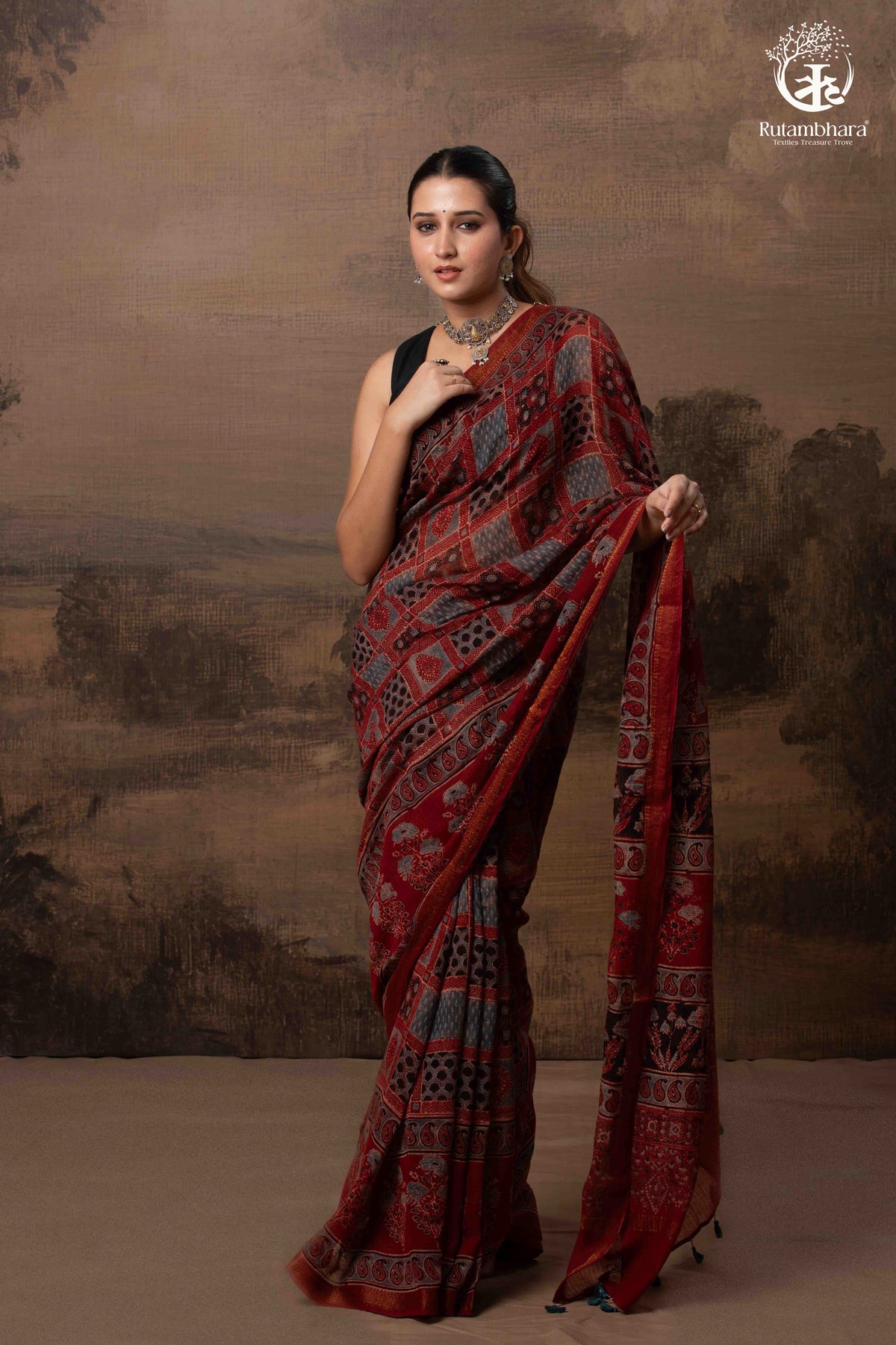 Ushraa - Red Ajrakh Silk Cotton Saree with Delicate Gold Zari Border