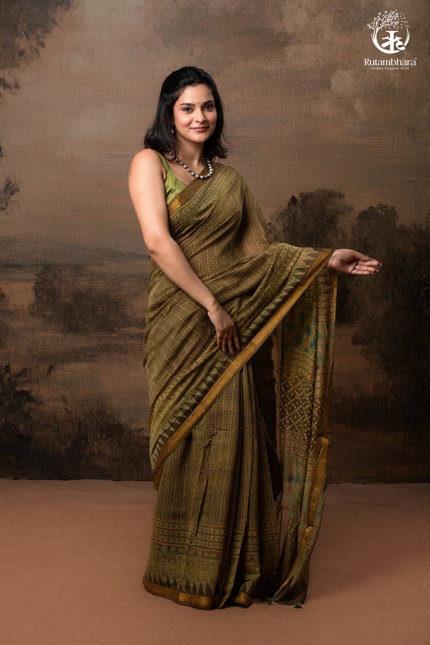 Ushraa - Earthy Olive Ajrakh Kota Silk Cotton Saree with Delicate Gold Zari Border