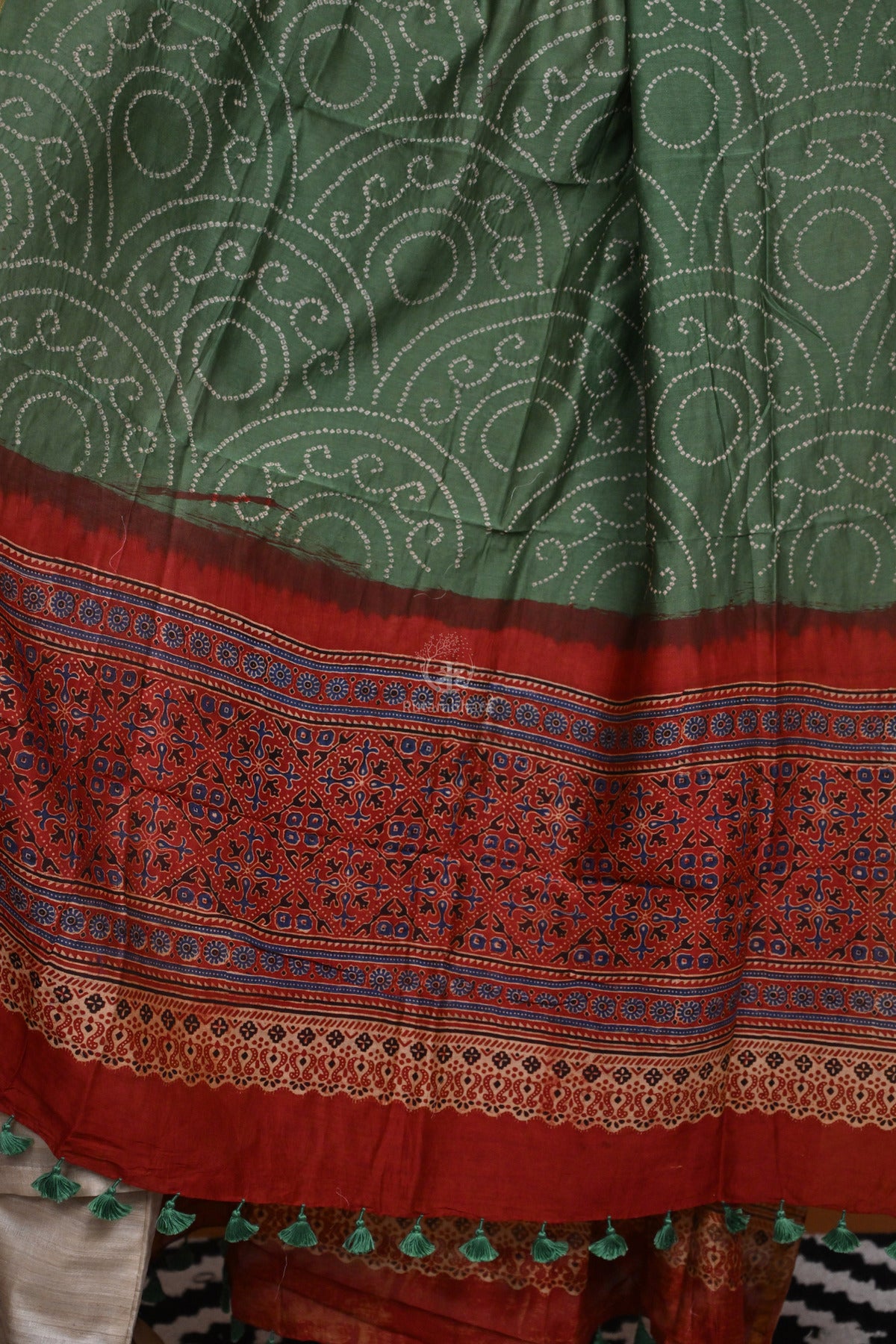 Rakbaa - Green Red Ajrakh Rai Bandhej dupatta in Chanderi.
