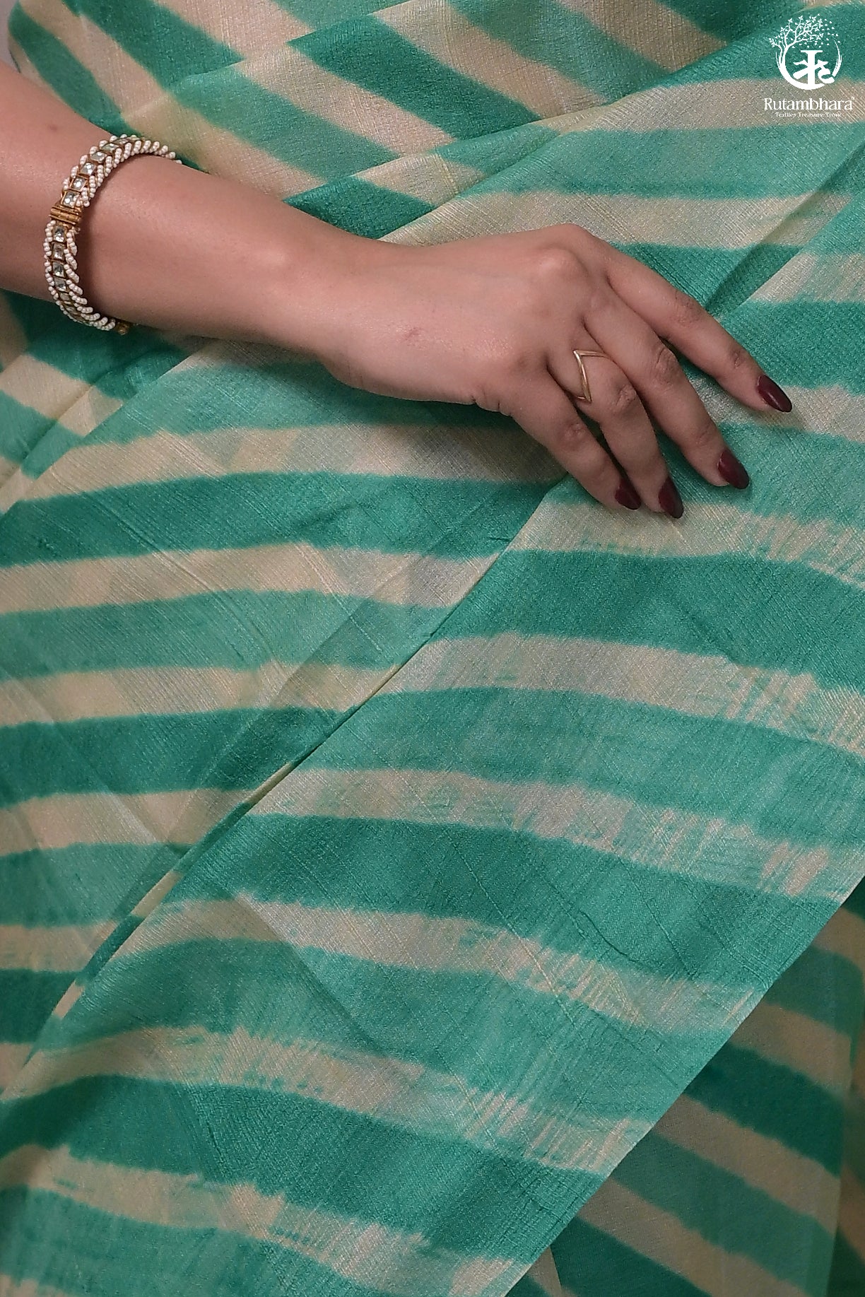 DHANAK - JADE GREEN N OFF WHITE LEHERIYA SAREE IN TUSSAR SILK