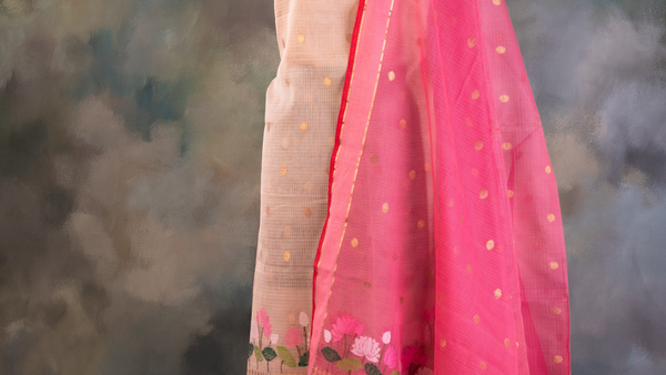 Blush beige and rani pink Zari Kota Doria suit set with floral zari accents