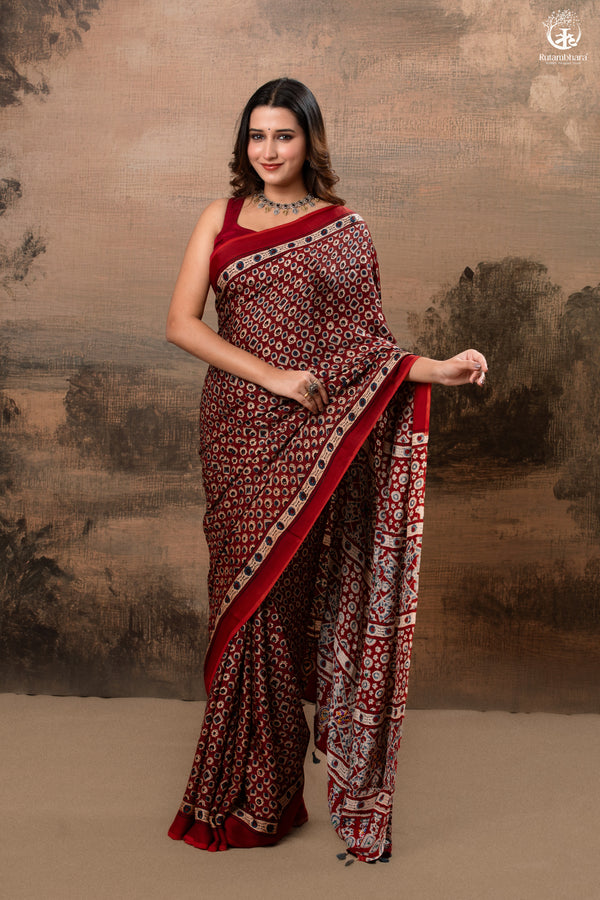 Ushraa - Deep Red Ajrakh Modal Silk Saree With Hand-Embroidered Pallu-RUTAMBHARA-RUTAMBHARA