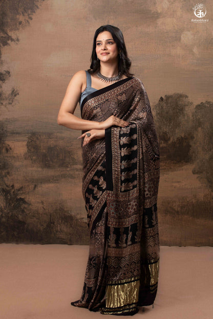 Ushraa - Ajrakh Hand Block Printed Black Modal Silk Saree With Gold Zari Border-RUTAMBHARA-RUTAMBHARA
