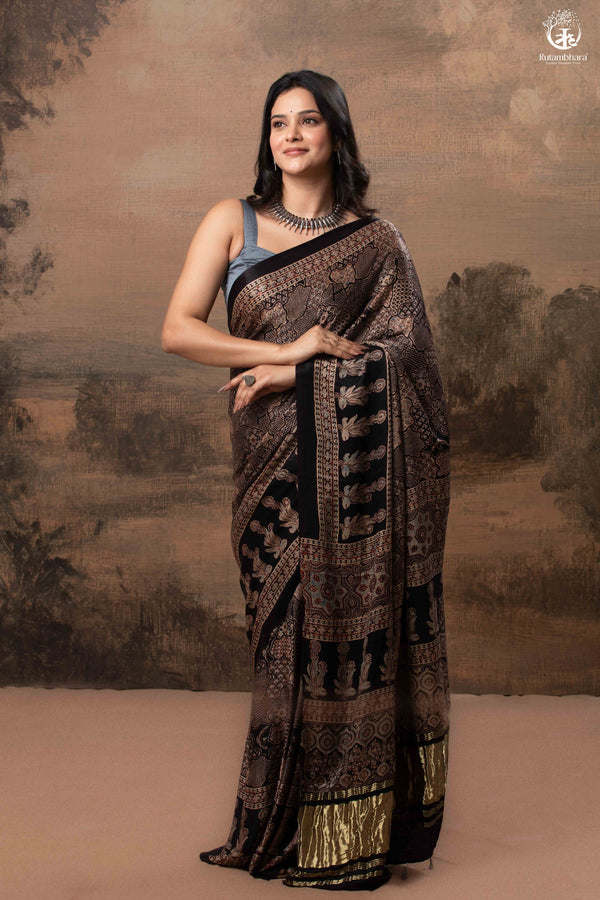 Ushraa - Ajrakh Hand Block Printed Black Modal Silk Saree With Gold Zari Border-RUTAMBHARA-RUTAMBHARA