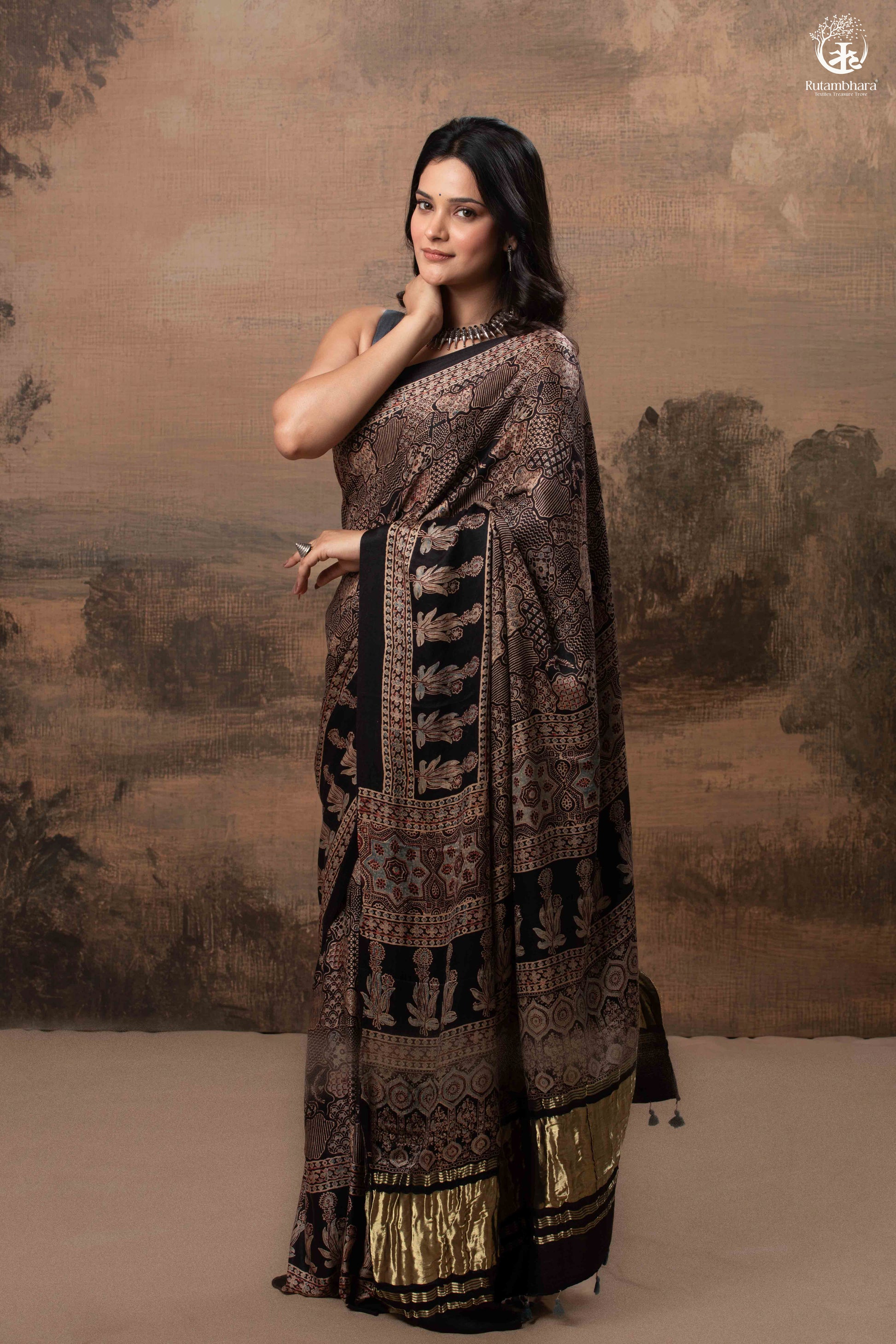 Ushraa - Ajrakh Hand Block Printed Black Modal Silk Saree With Gold Zari Border-RUTAMBHARA-RUTAMBHARA