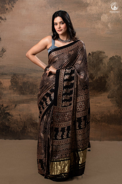 Ushraa - Ajrakh Hand Block Printed Black Modal Silk Saree With Gold Zari Border-RUTAMBHARA-RUTAMBHARA