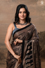 Ushraa - Ajrakh Hand Block Printed Black Modal Silk Saree With Gold Zari Border-RUTAMBHARA-RUTAMBHARA