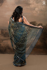 Ushraa - Mystic Teal Blue Ajrakh Charm in Cotton Silk With Zari Border-RUTAMBHARA-RUTAMBHARA