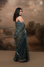 Ushraa - Mystic Teal Blue Ajrakh Charm in Cotton Silk With Zari Border-RUTAMBHARA-RUTAMBHARA
