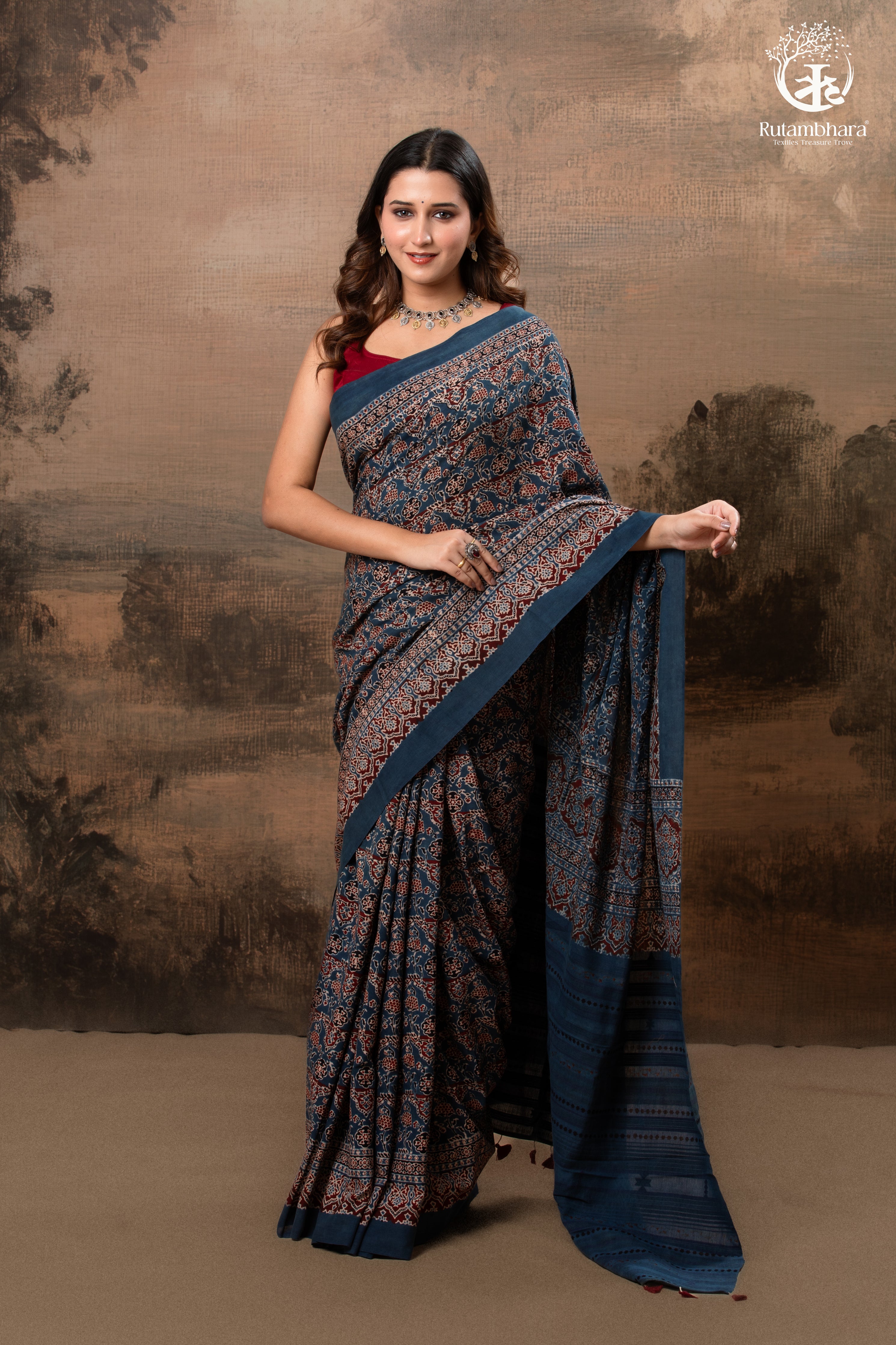 Ushraa - Ajrakh in Indigo Hues on a handwoven Kutchhi weave Kala Cotton Saree
