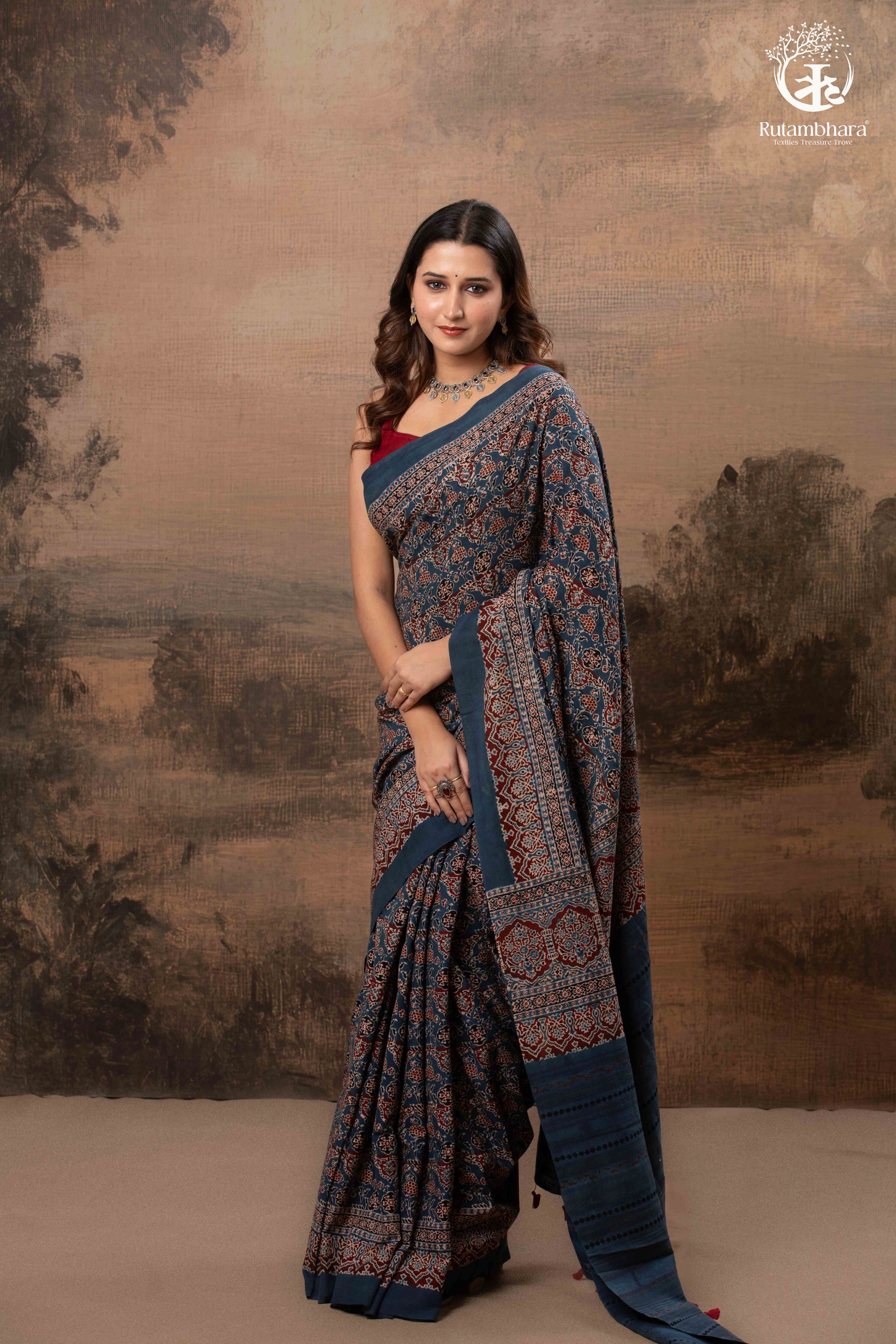 Ushraa - Ajrakh in Indigo Hues on a handwoven Kutchhi weave Kala Cotton Saree