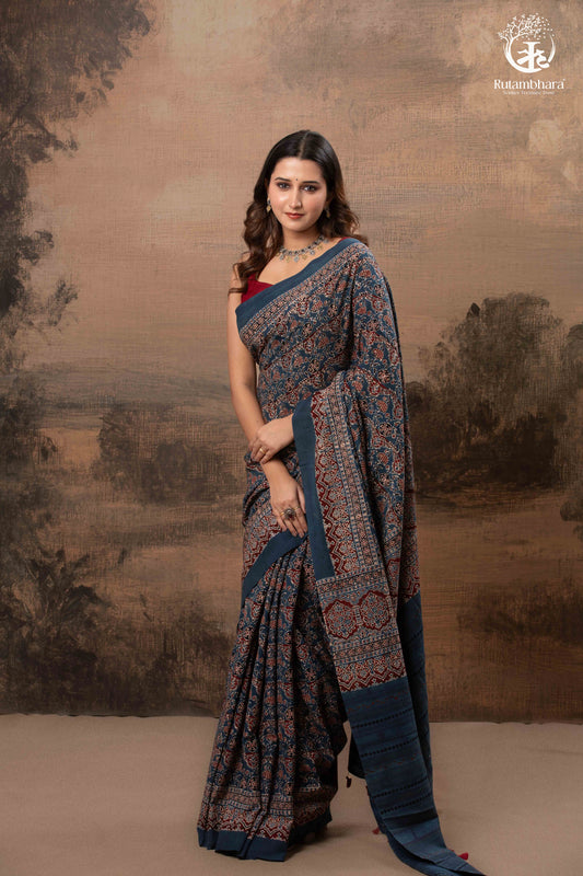 Ushraa - Ajrakh in Indigo Hues on a handwoven Kutchhi weave Kala Cotton Saree