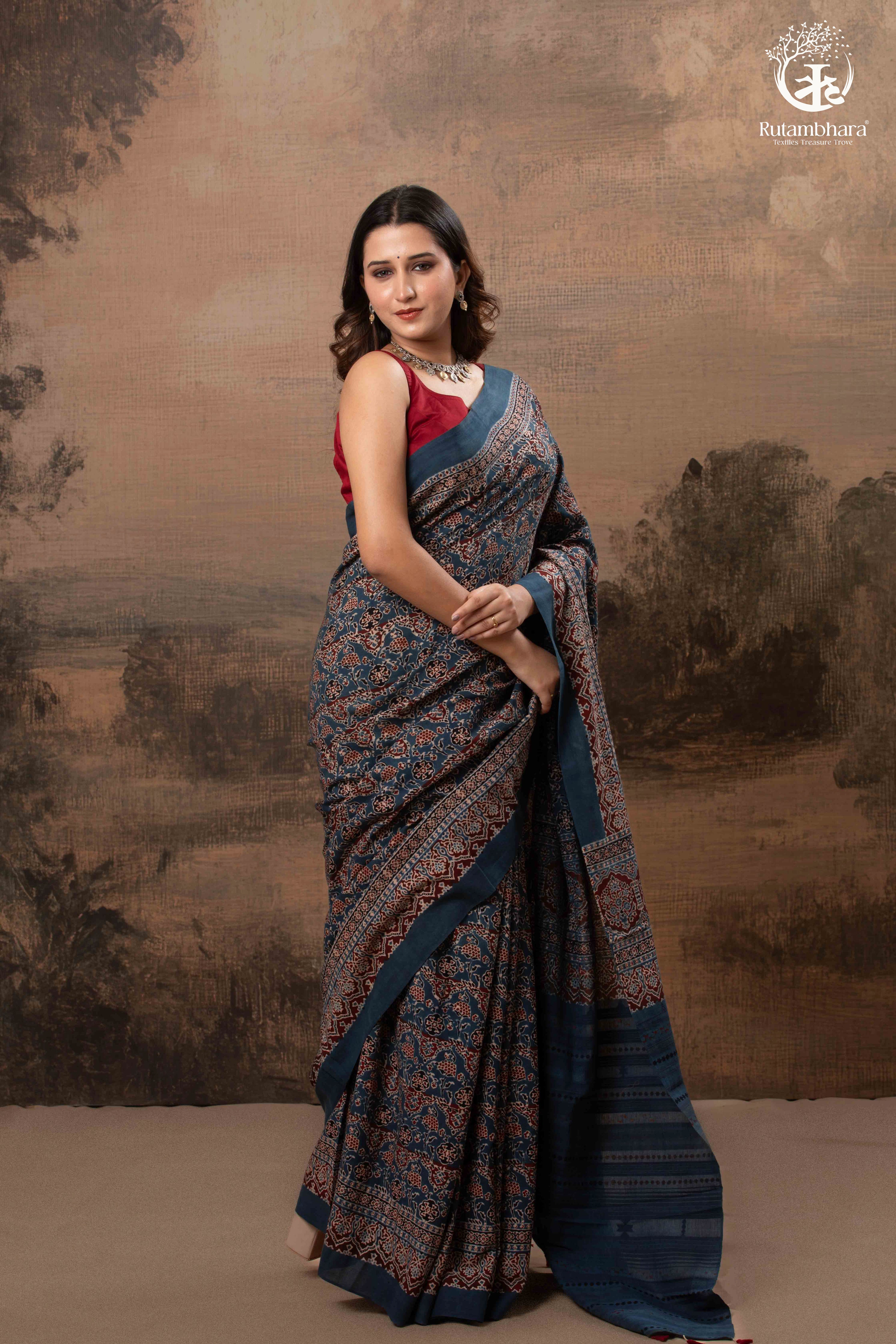 Ushraa - Ajrakh in Indigo Hues on a handwoven Kutchhi weave Kala Cotton Saree