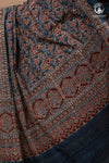 Ushraa - Ajrakh in Indigo Hues on a handwoven Kutchhi weave Kala Cotton Saree