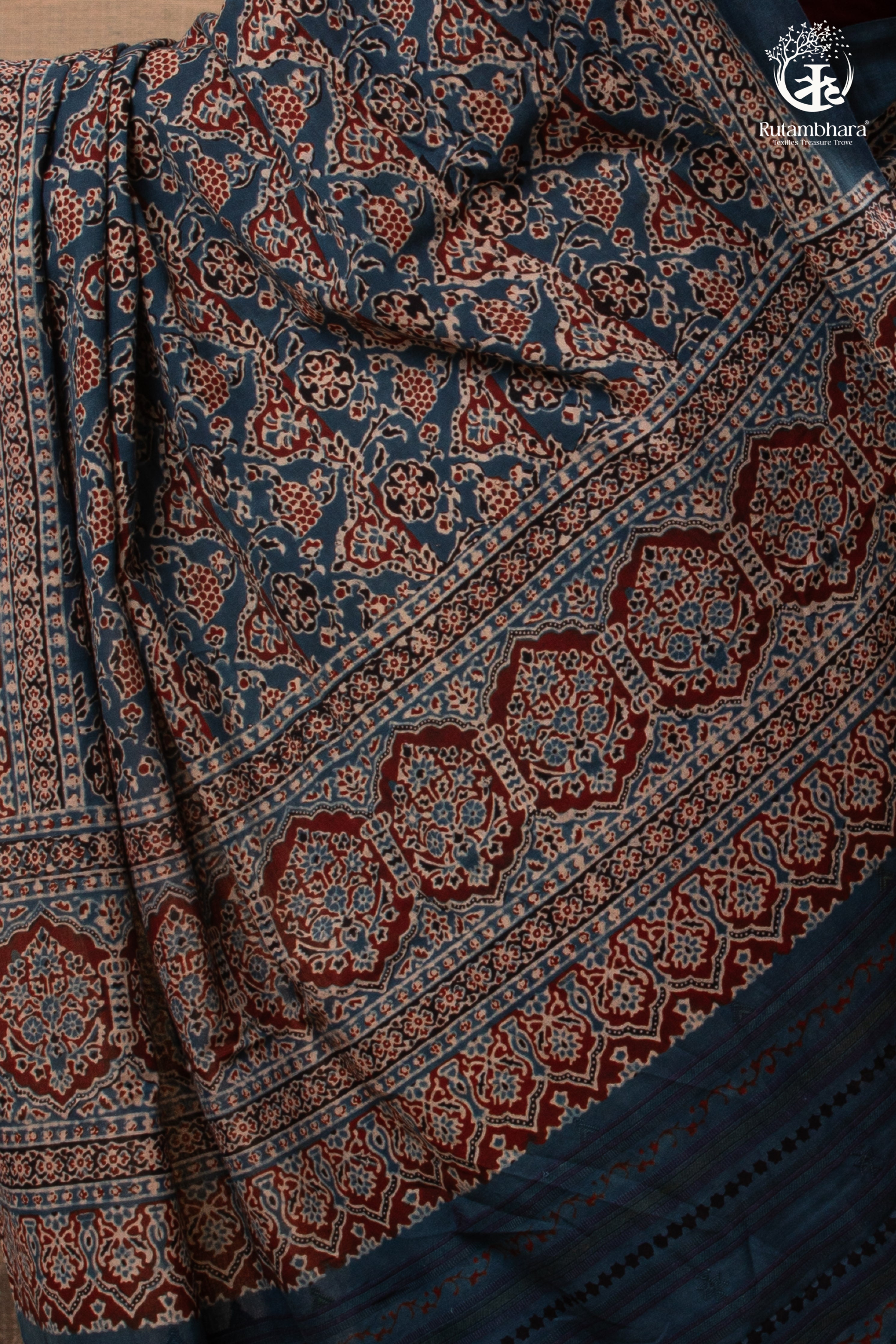 Ushraa - Ajrakh in Indigo Hues on a handwoven Kutchhi weave Kala Cotton Saree