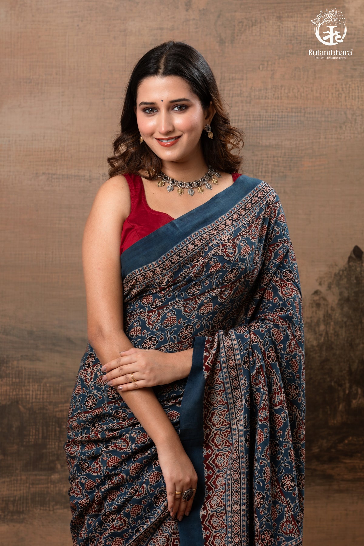 Ushraa - Ajrakh in Indigo Hues on a handwoven Kutchhi weave Kala Cotton Saree