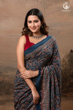 Ushraa - Ajrakh in Indigo Hues on a handwoven Kutchhi weave Kala Cotton Saree-RUTAMBHARA-RUTAMBHARA