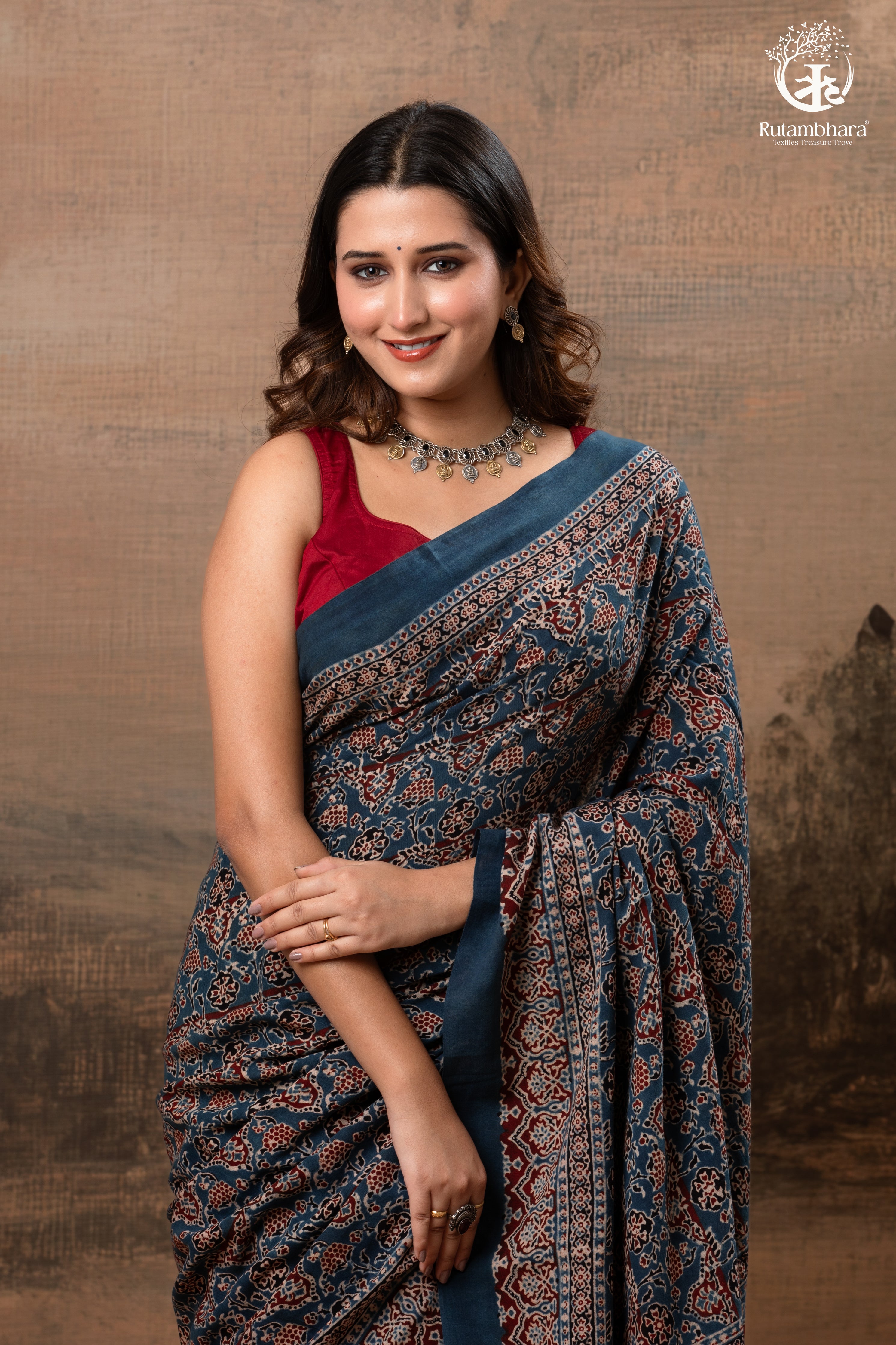 Ushraa - Ajrakh in Indigo Hues on a handwoven Kutchhi weave Kala Cotton Saree