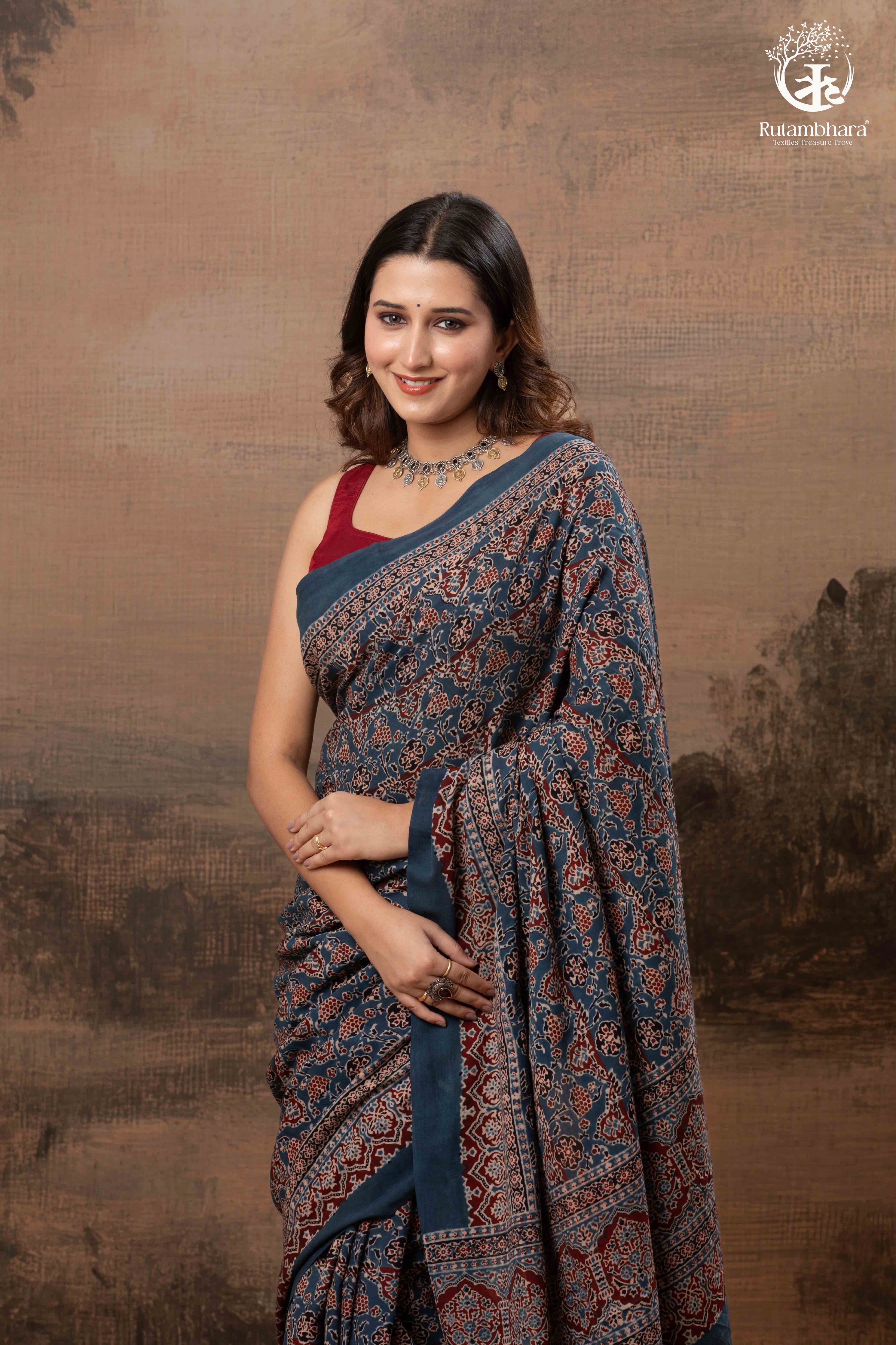 Ushraa - Ajrakh in Indigo Hues on a handwoven Kutchhi weave Kala Cotton Saree
