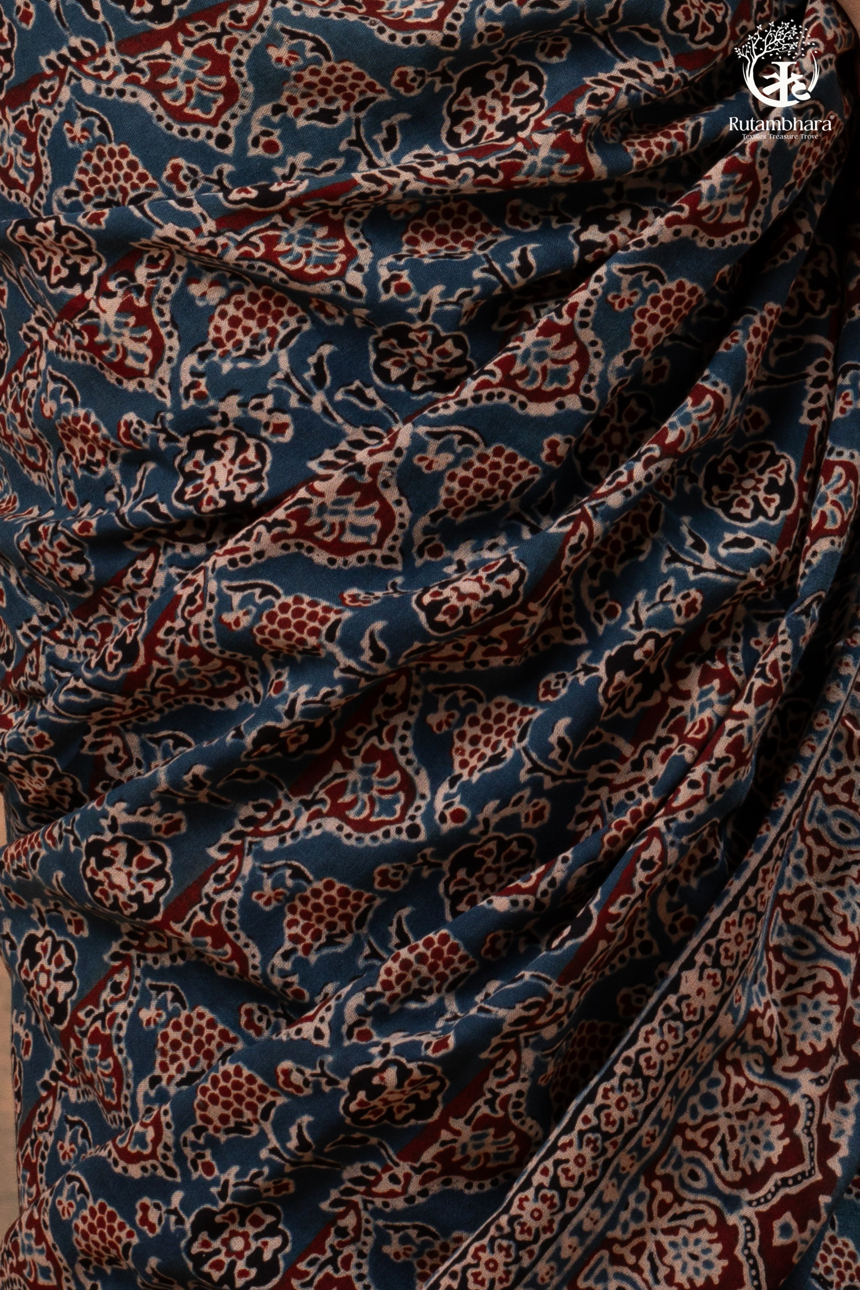 Ushraa - Ajrakh in Indigo Hues on a handwoven Kutchhi weave Kala Cotton Saree