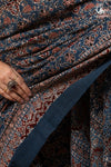 Ushraa - Ajrakh in Indigo Hues on a handwoven Kutchhi weave Kala Cotton Saree