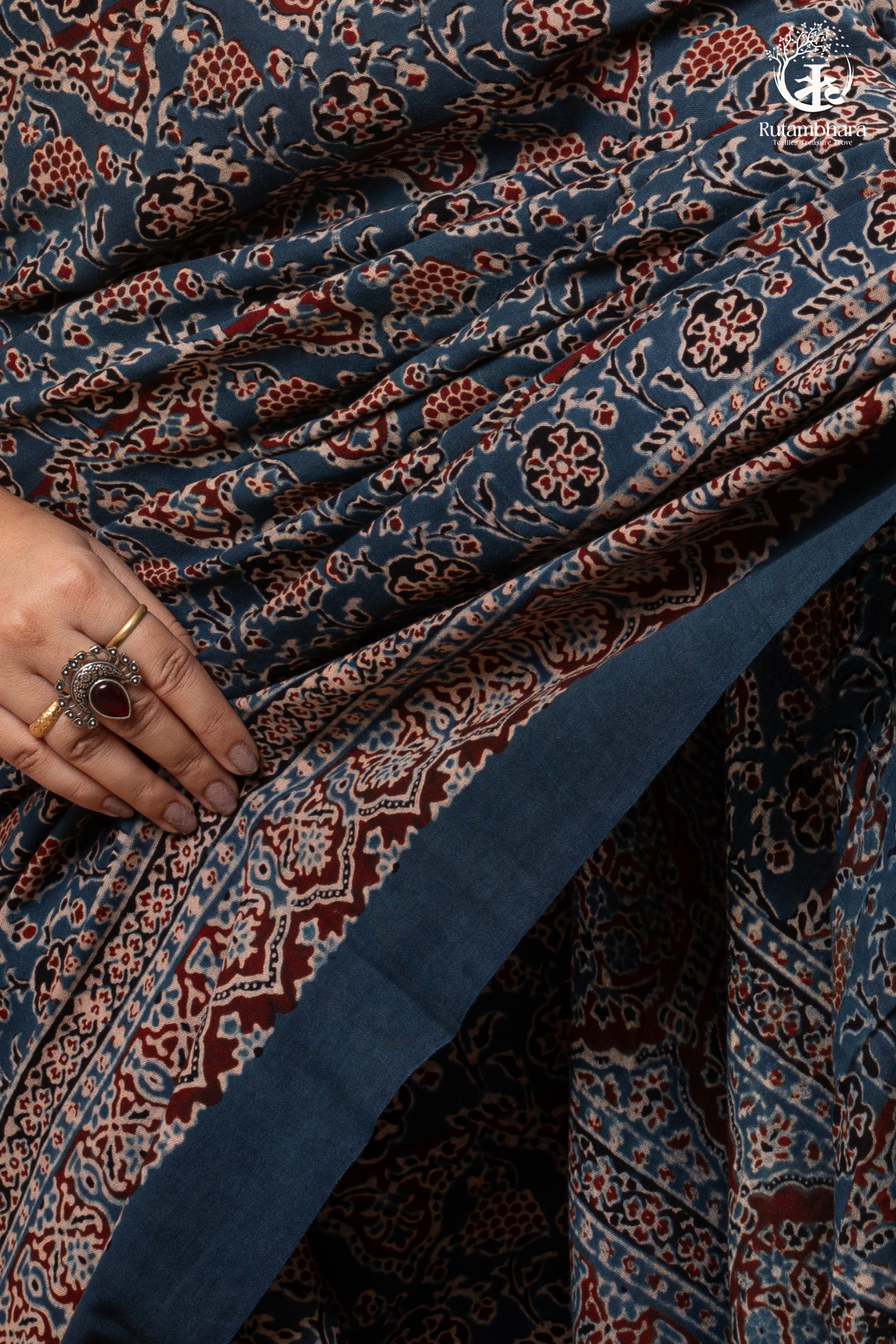 Ushraa - Ajrakh in Indigo Hues on a handwoven Kutchhi weave Kala Cotton Saree