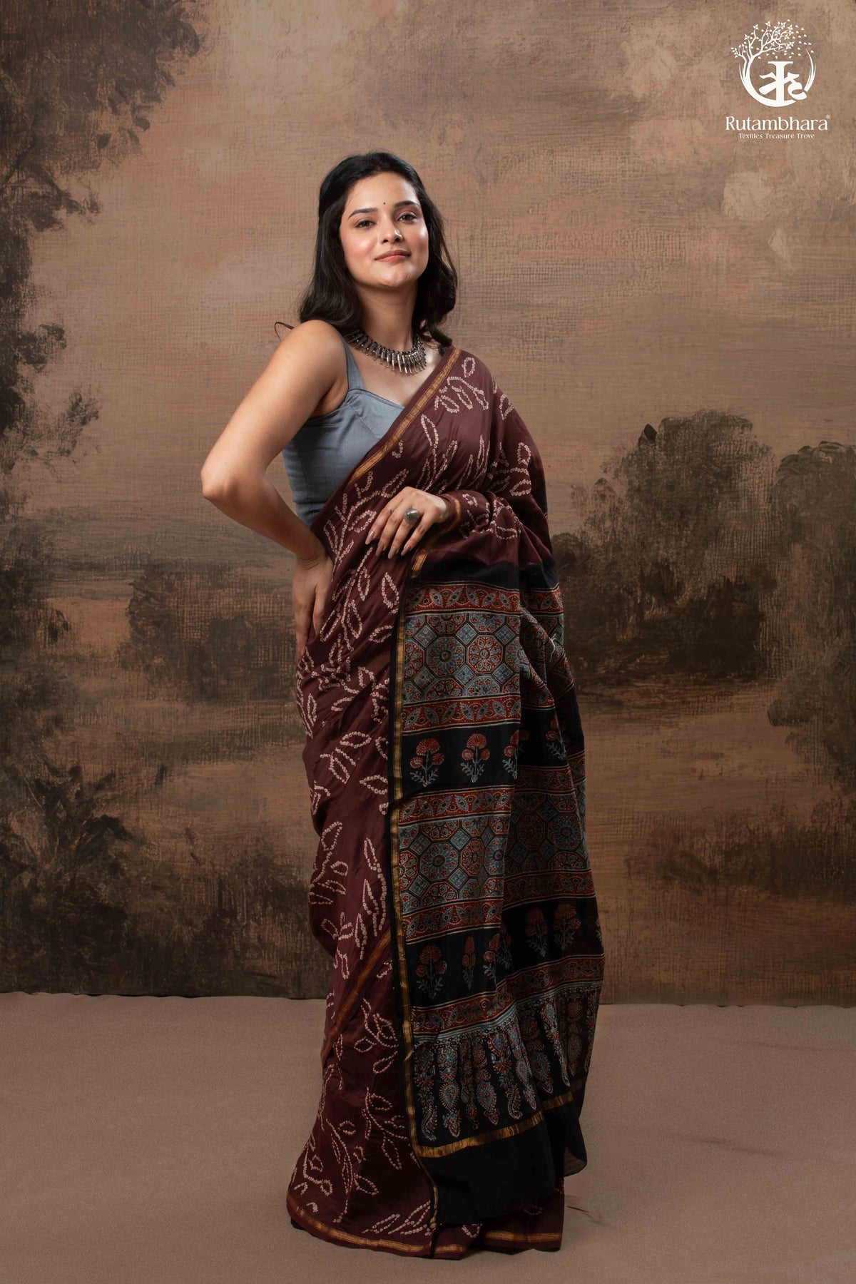 Ushraa – Chocolate Brown Ajrakh Saree with Handcrafted Bandhani Accents