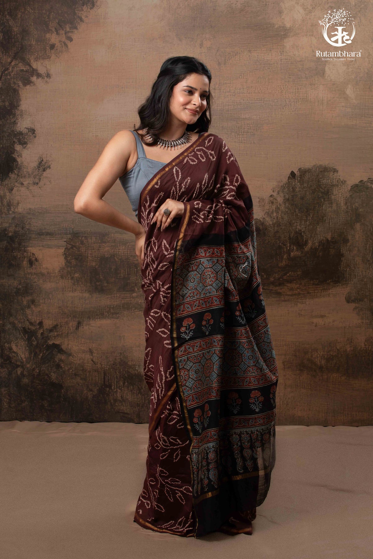 Ushraa – Chocolate Brown Ajrakh Saree with Handcrafted Bandhani Accents