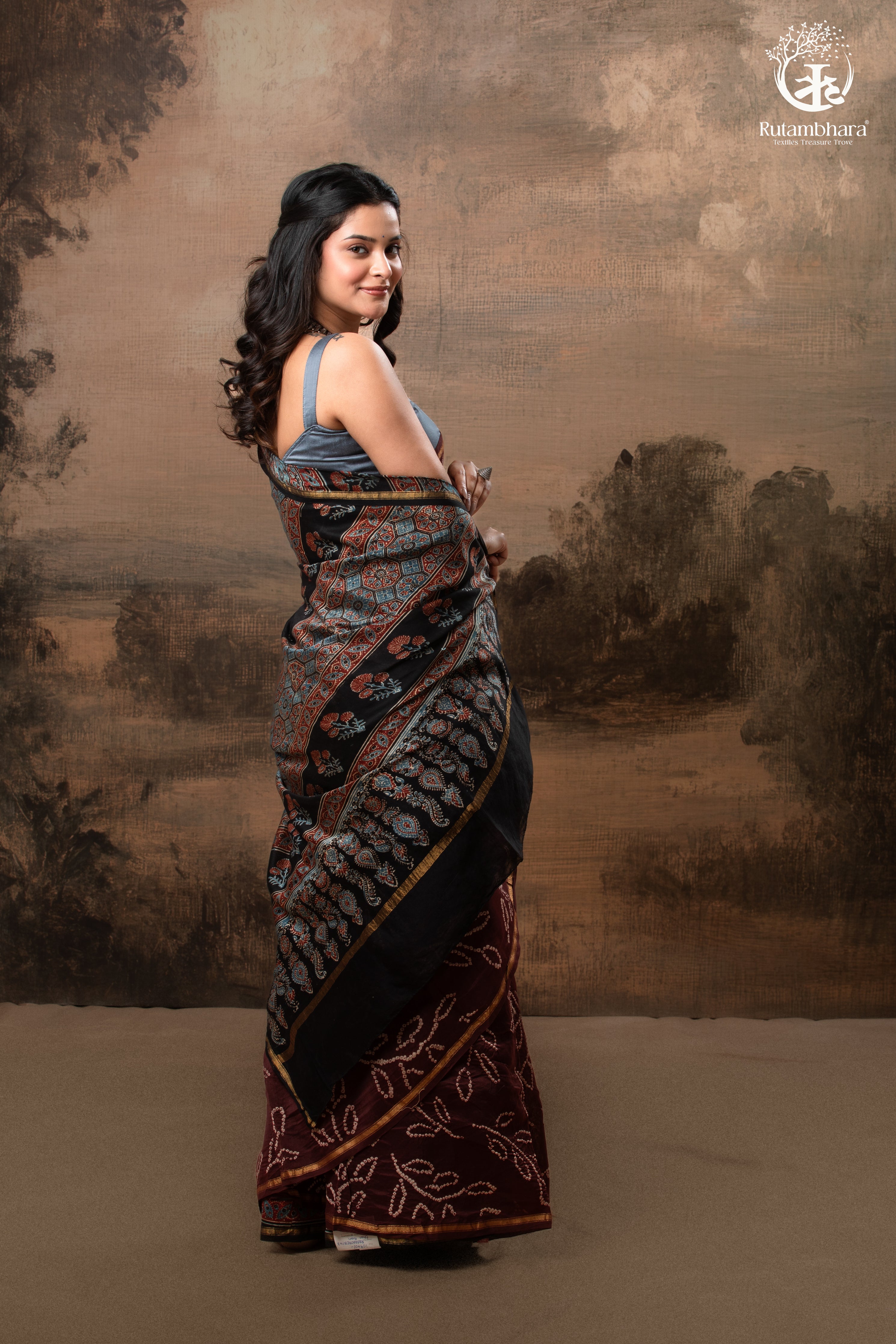 Ushraa – Chocolate Brown Ajrakh Saree with Handcrafted Bandhani Accents
