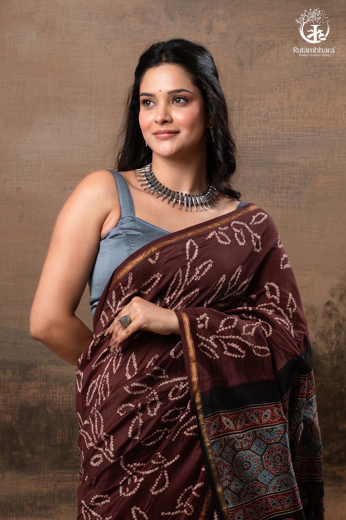 Ushraa – Chocolate Brown Ajrakh Saree with Handcrafted Bandhani Accents