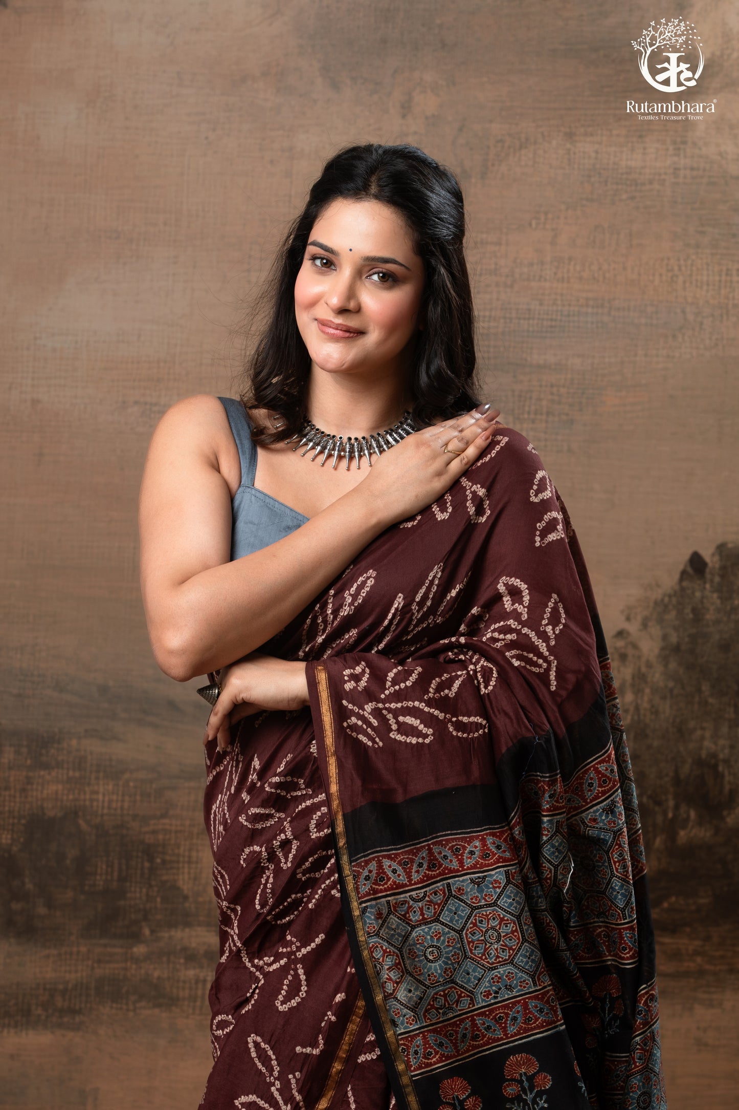 Ushraa – Chocolate Brown Ajrakh Saree with Handcrafted Bandhani Accents