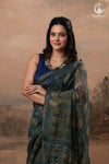Ushraa - Indigo Ajrakh Print Kota Silk Cotton Saree with Subtle Zari Charm