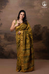 Ushraa - Mustard Green Ajrakh Hand Block Printed Cotton Silk Saree with Gold Zari Border