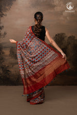 Ushraa - Rust Red and Indigo Ajrakh Silk Cotton Saree with Delicate Gold Zari Border-RUTAMBHARA-RUTAMBHARA