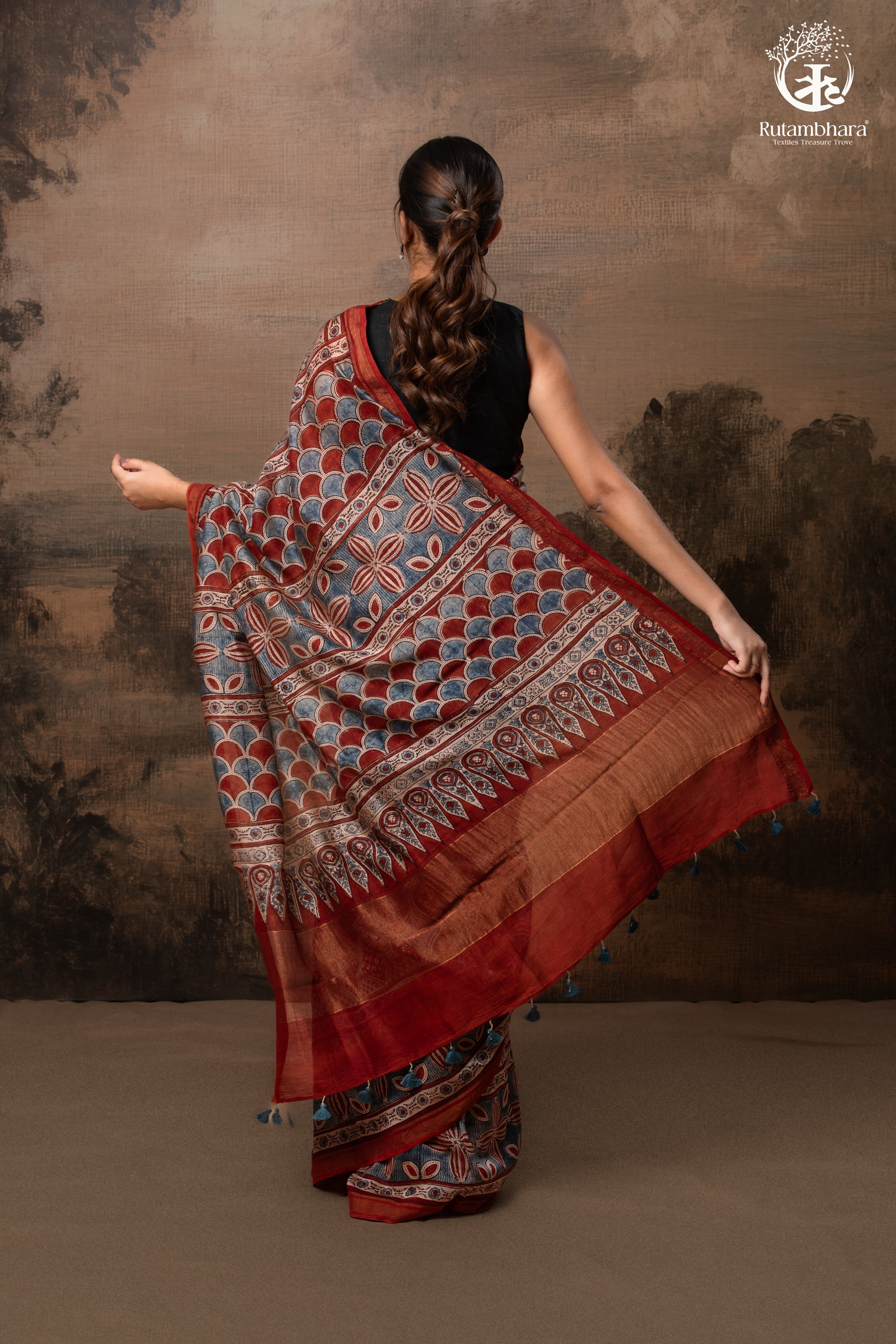 Ushraa - Rust Red and Indigo Ajrakh Silk Cotton Saree with Delicate Gold Zari Border