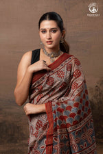 Ushraa - Rust Red and Indigo Ajrakh Silk Cotton Saree with Delicate Gold Zari Border-RUTAMBHARA-RUTAMBHARA
