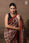 Ushraa - Rust Red and Indigo Ajrakh Silk Cotton Saree with Delicate Gold Zari Border