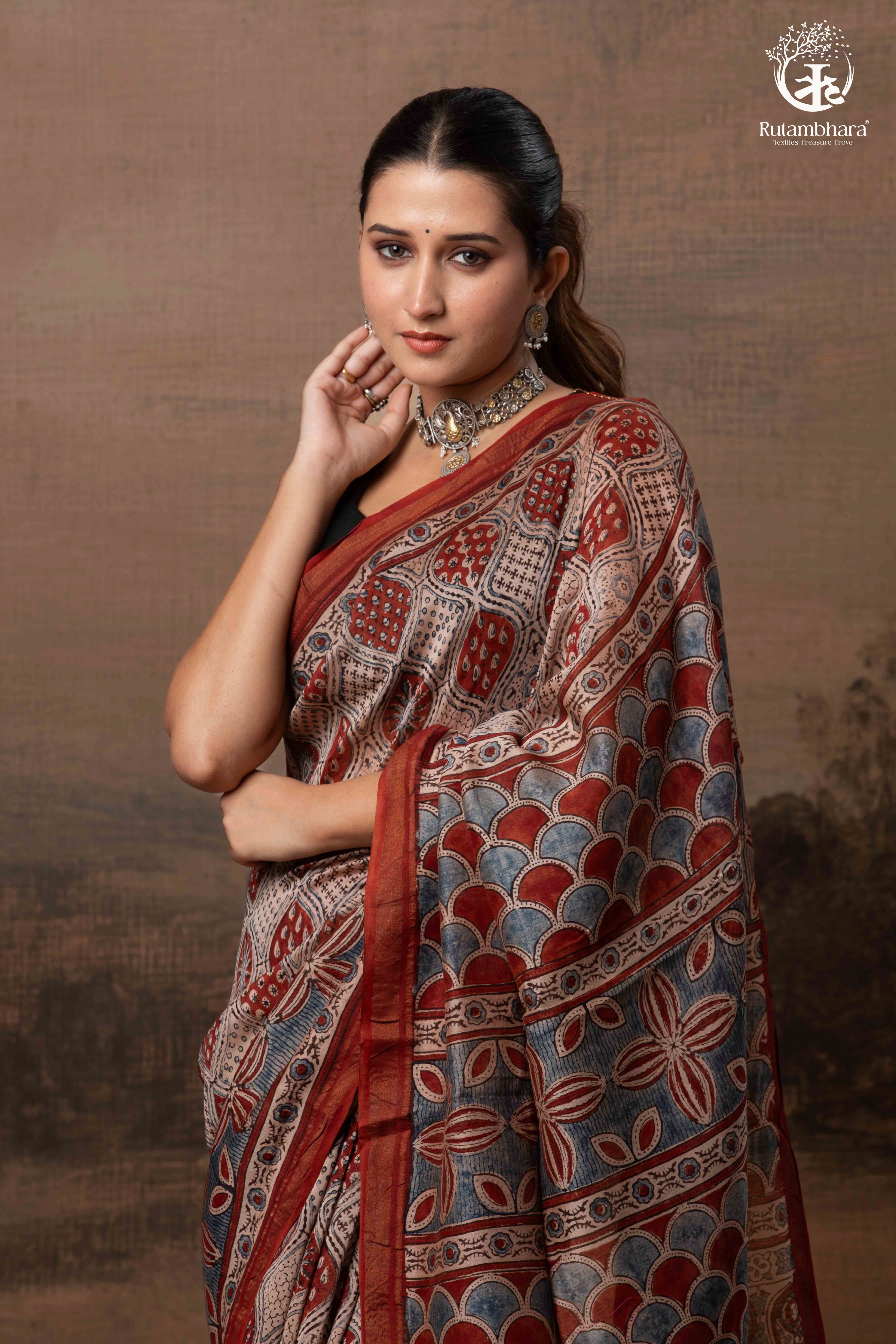 Ushraa - Rust Red and Indigo Ajrakh Silk Cotton Saree with Delicate Gold Zari Border