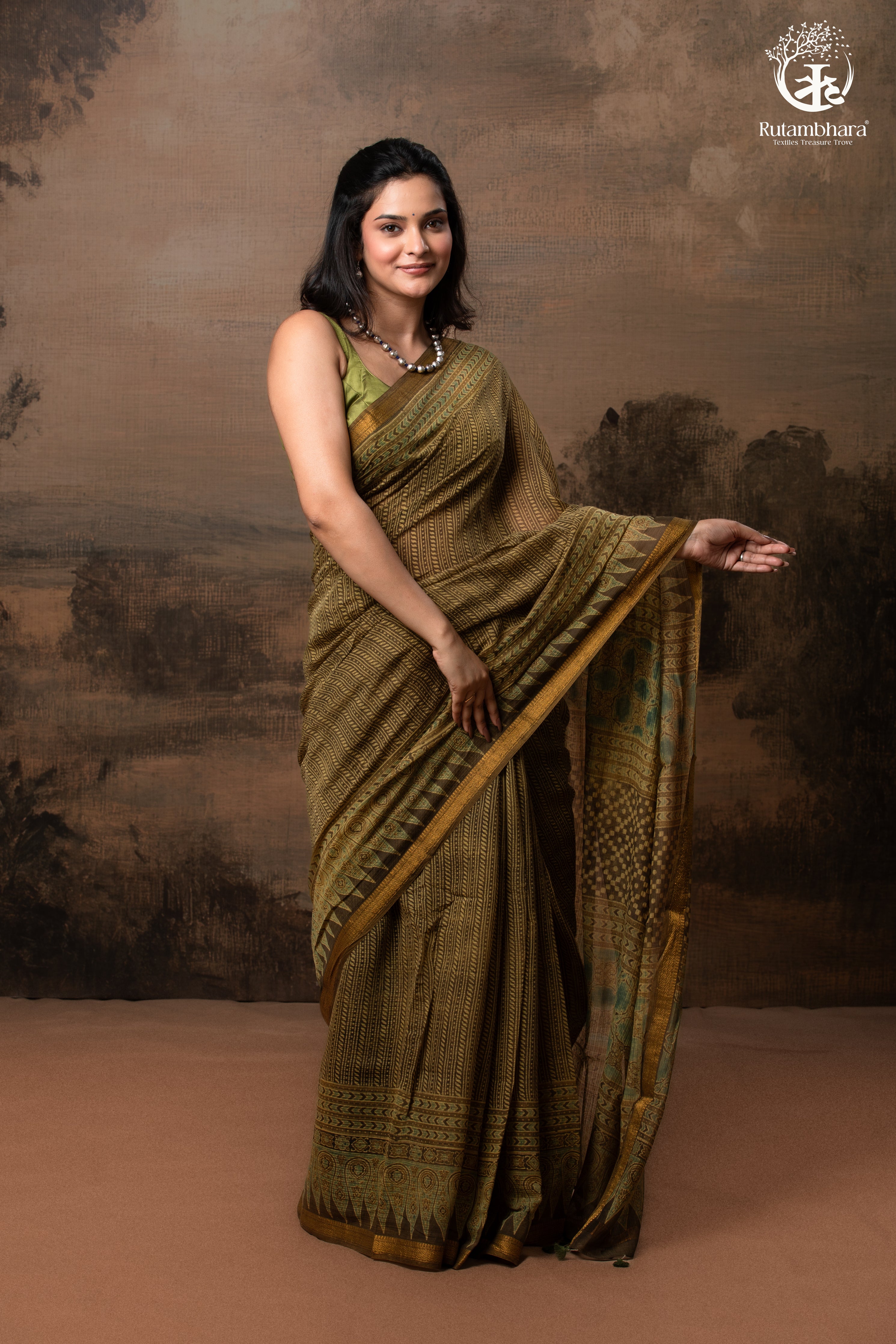 Ushraa -  Earthy Olive Ajrakh Kota Silk Cotton Saree with Delicate Gold Zari Border