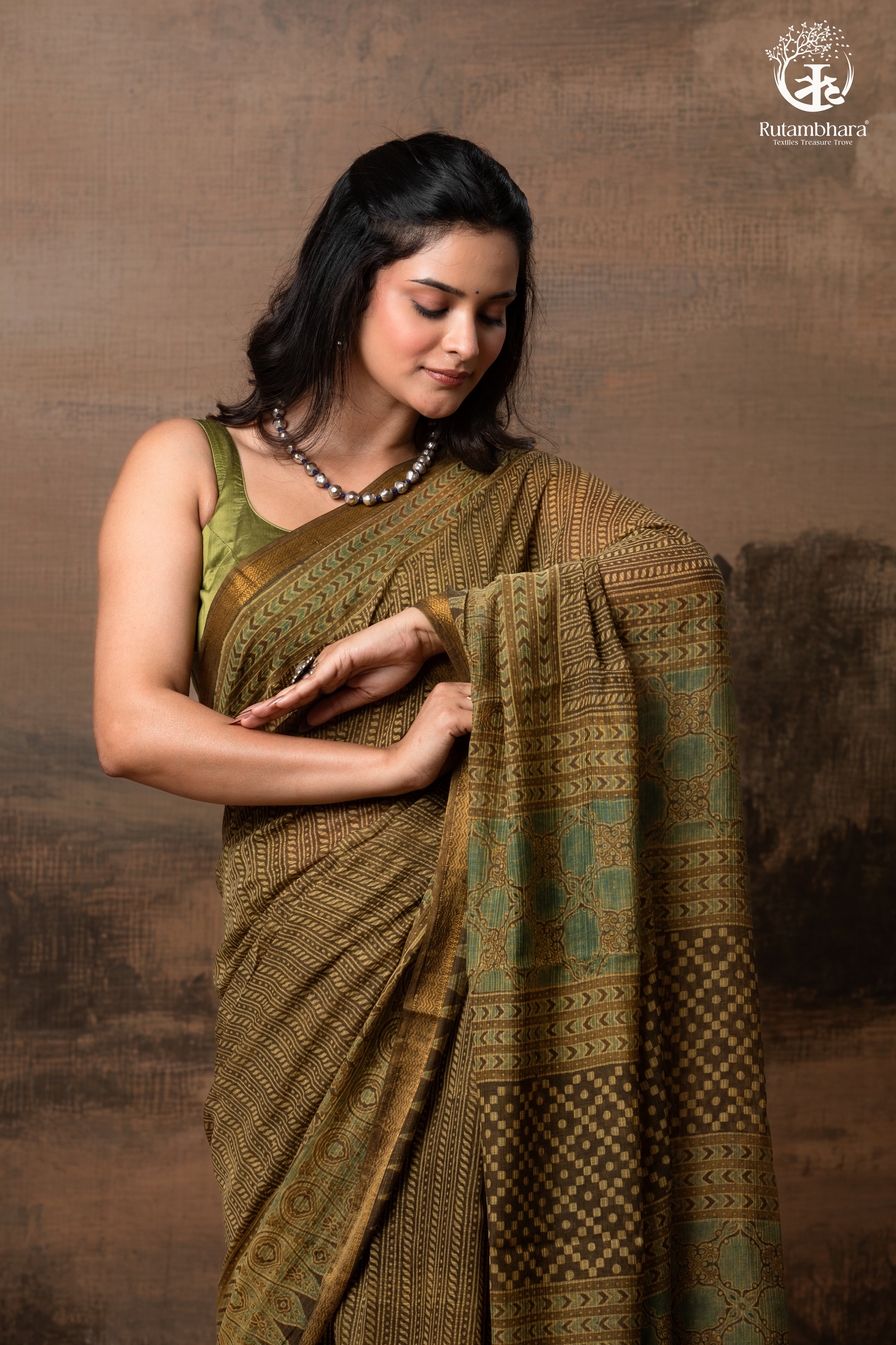 Ushraa -  Earthy Olive Ajrakh Kota Silk Cotton Saree with Delicate Gold Zari Border