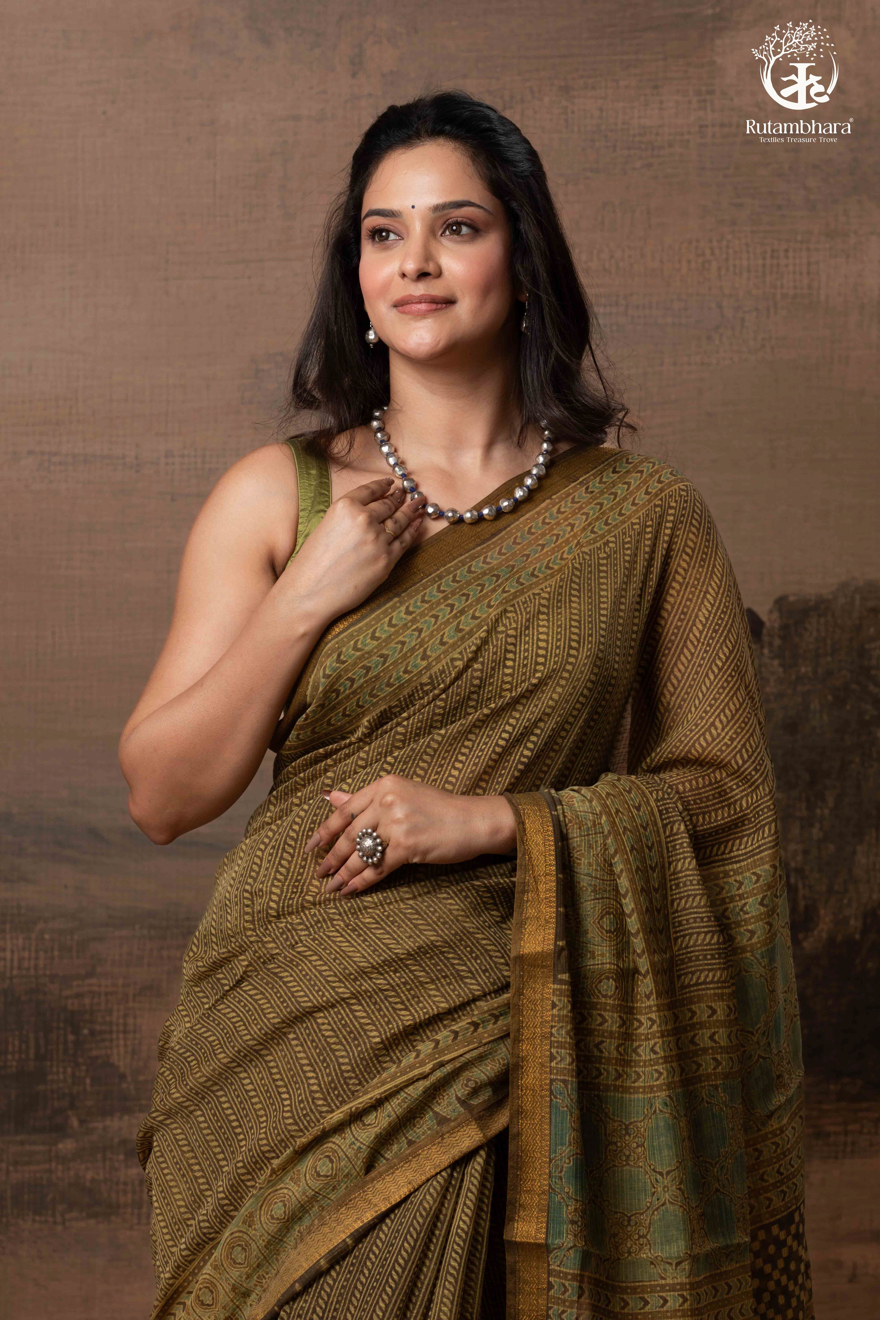 Ushraa -  Earthy Olive Ajrakh Kota Silk Cotton Saree with Delicate Gold Zari Border