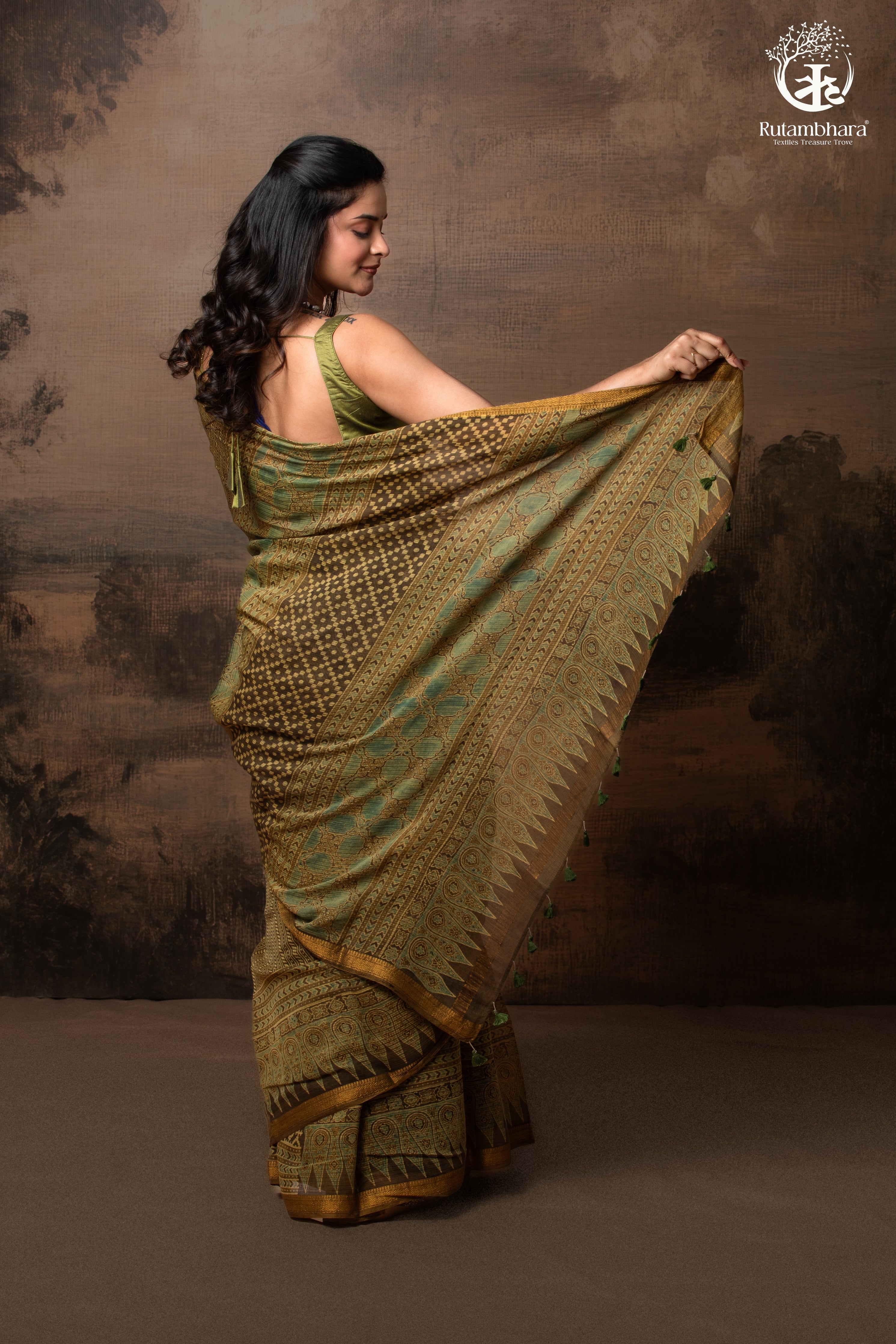 Ushraa -  Earthy Olive Ajrakh Kota Silk Cotton Saree with Delicate Gold Zari Border