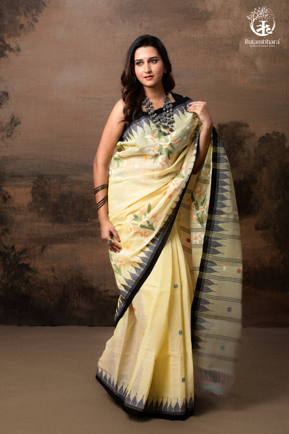 Woman wearing a traditional saree with a scenic background
