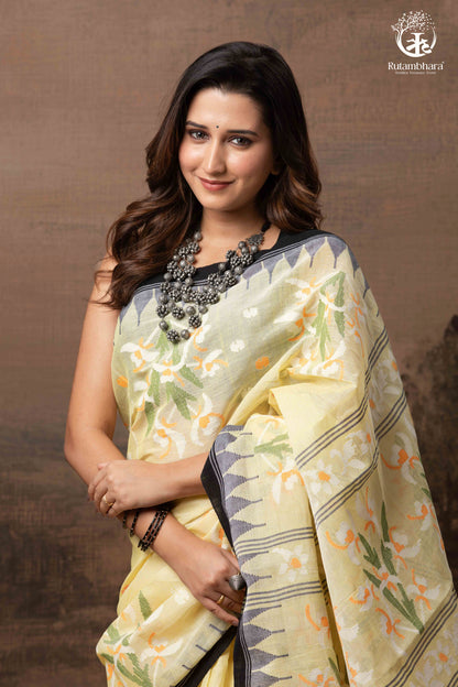 Woman wearing a floral saree with a brown background