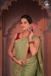 BHADRA - Elegant Pastel green Pure Cotton Saree with Gold Border and Kalamkari Blouse