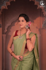 BHADRA - Elegant Pastel green Pure Cotton Saree with Gold Border and Kalamkari Blouse-RUTAMBHARA-RUTAMBHARA